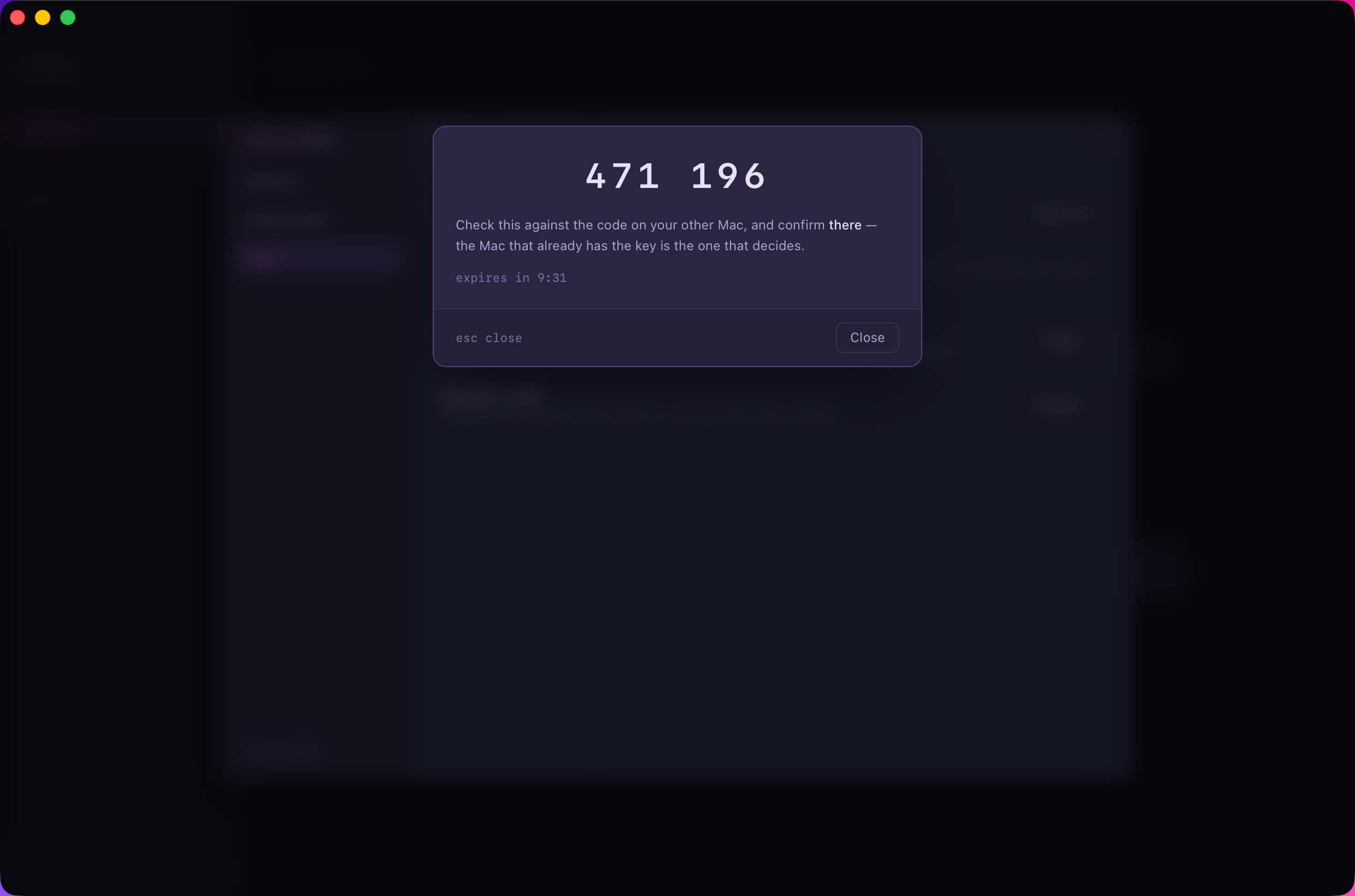 The requesting Mac showing the six-digit code and telling you to confirm on the other Mac